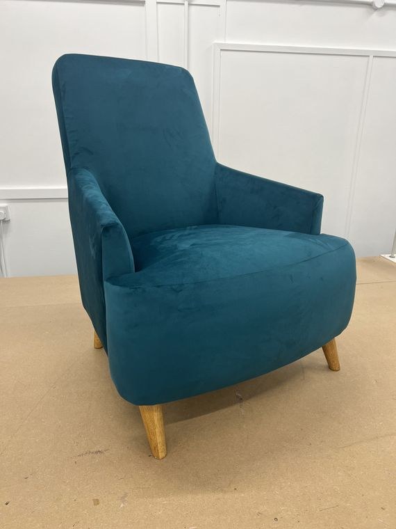 Mid-century armchair re-covered in teal velvet