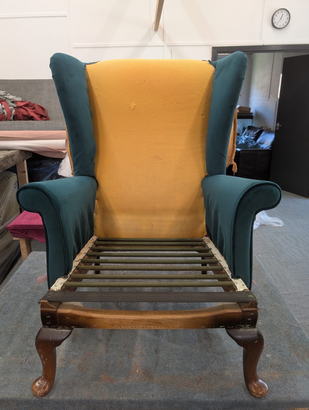 The inside arms on — the velvet worked down over the roll and into the seat.